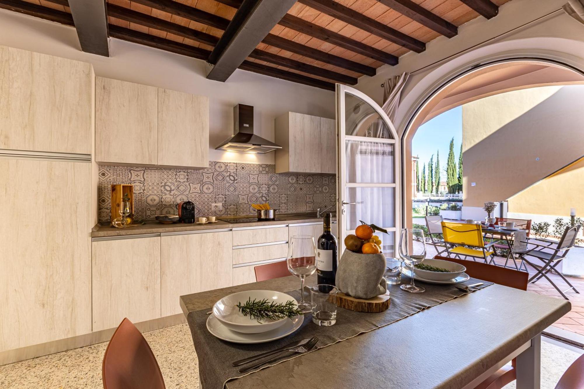 Ferienwohnung Le Residenze Chianni Zimmer foto